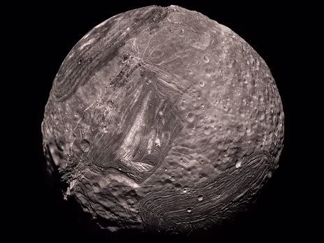 Nevada and Miranda: Geologic Siblings a Billion Miles Apart